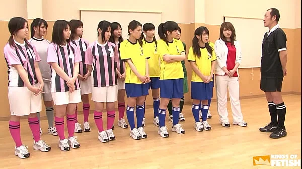 Japanese female team listen and take a lesson from their coach