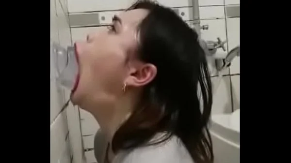 Asian deepthroating a dildo