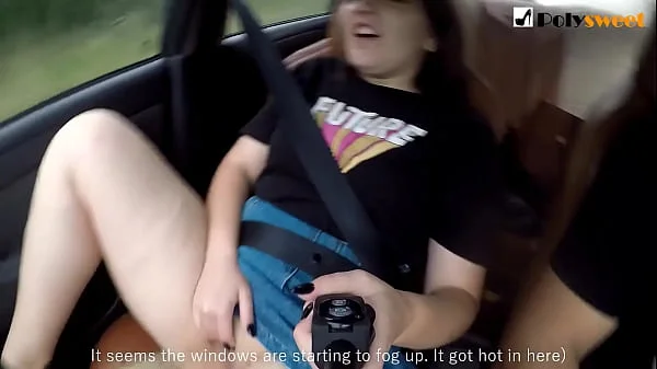 Public masturbation of a brunette in a car on the go. (eng sub)